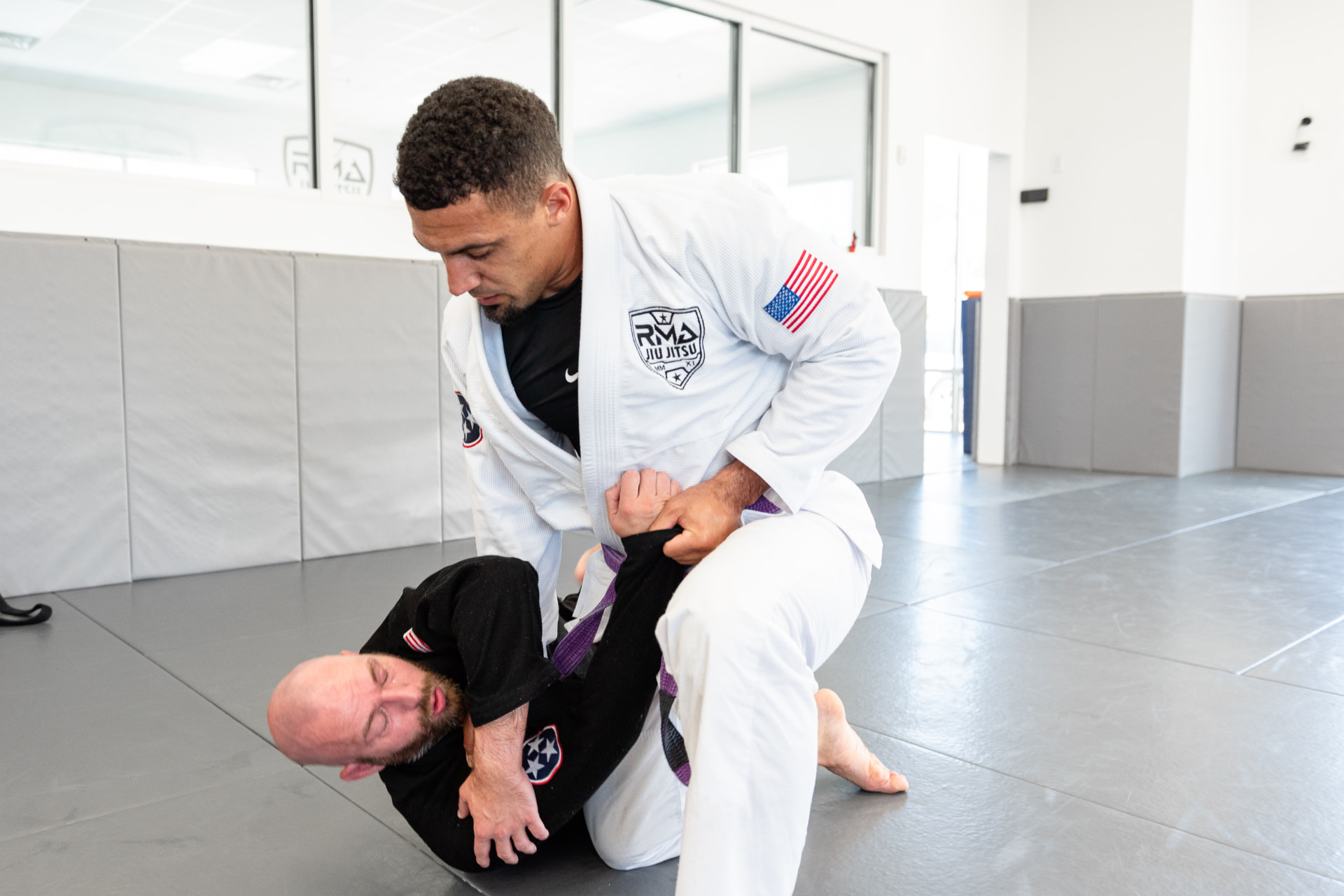 Advanced teen and adult Jiu-Jitsu students rolling at RMA — Nolensville, TN 37135