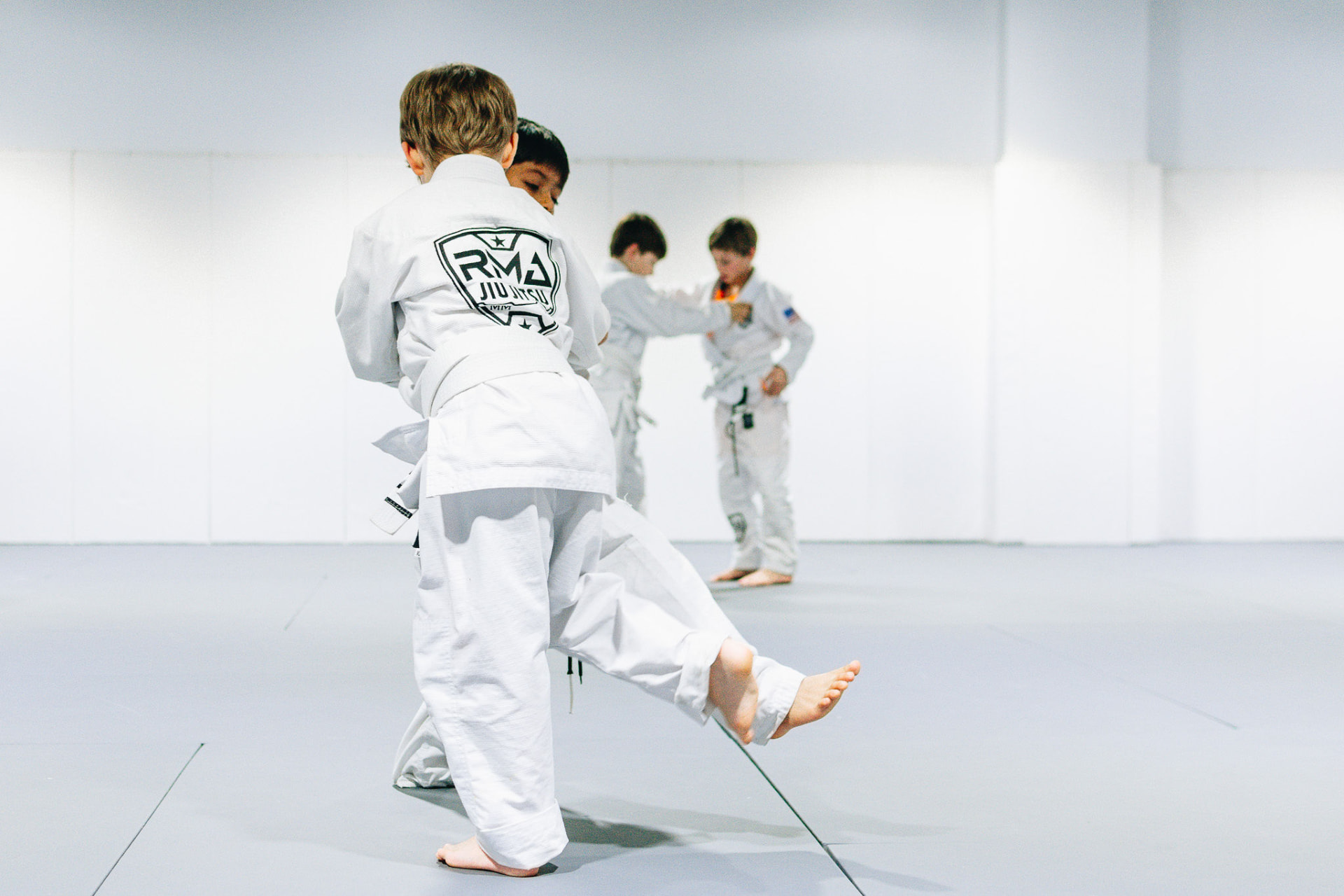 Young children in a Mighty Mites kids Brazilian Jiu-Jitsu class at RMA — Franklin, TN 37064