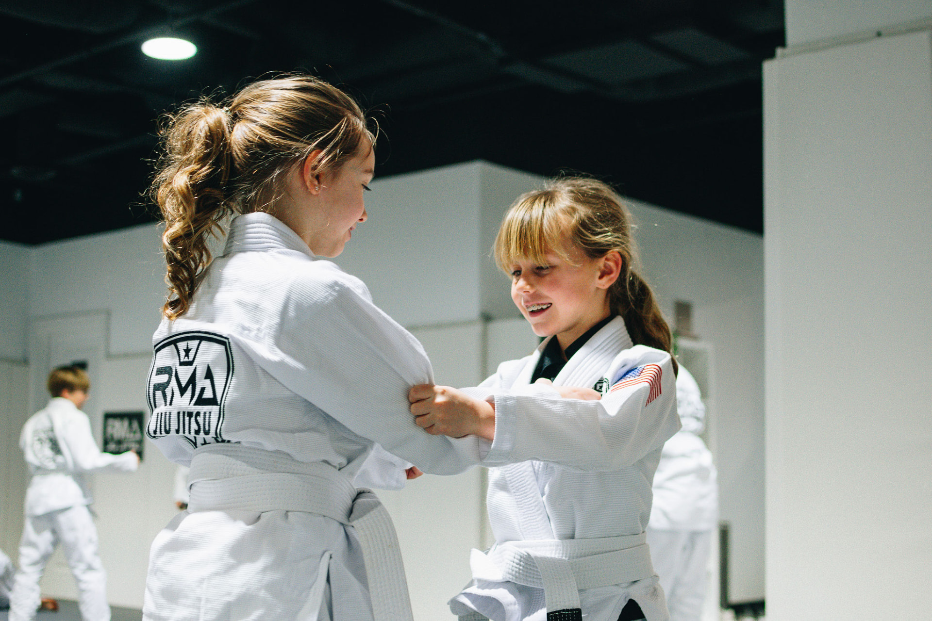 Kids drilling Brazilian Jiu-Jitsu techniques in the Pee Wees class at RMA — Franklin, TN 37064