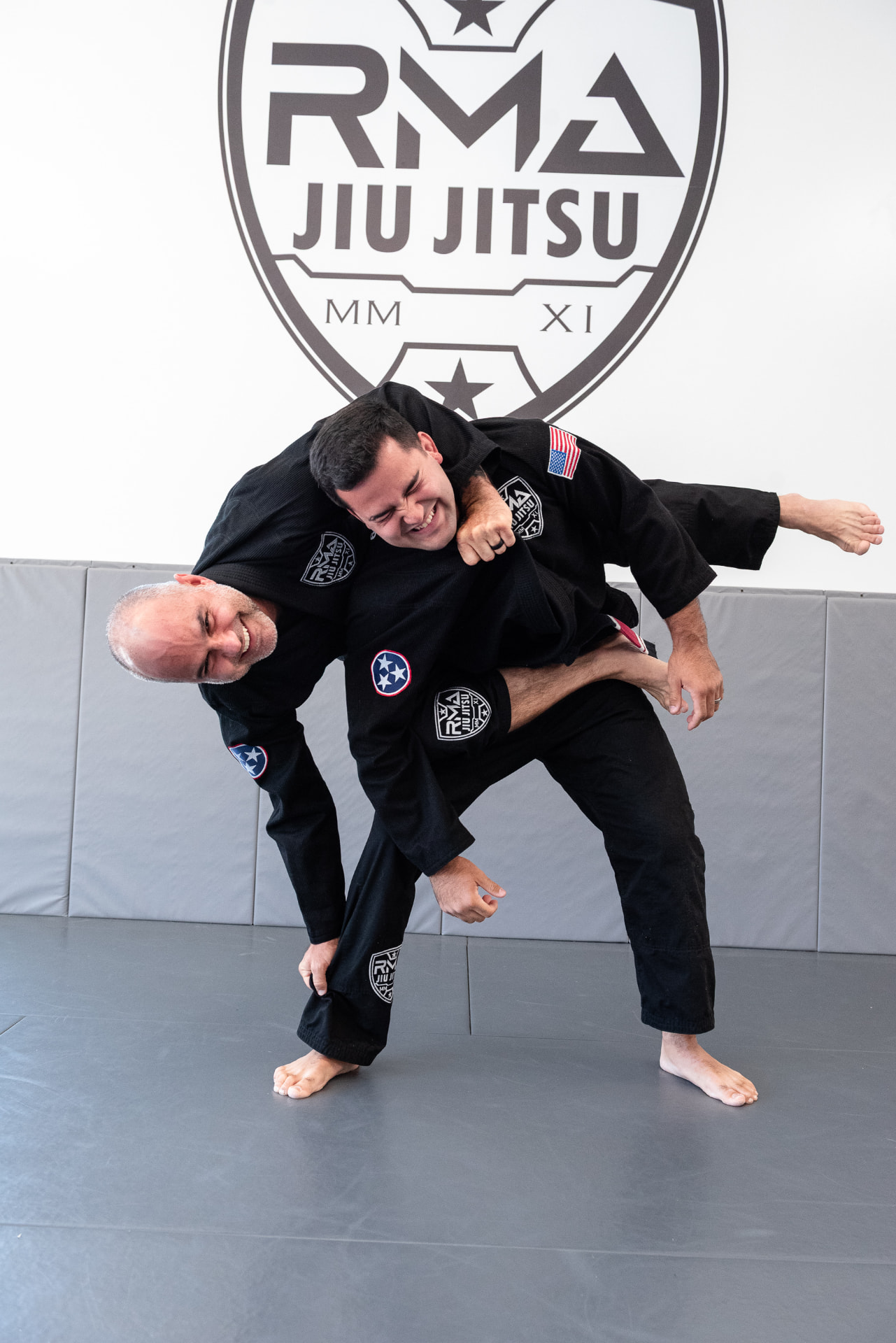Advanced teen and adult Jiu-Jitsu students rolling at RMA in Nolensville, TN