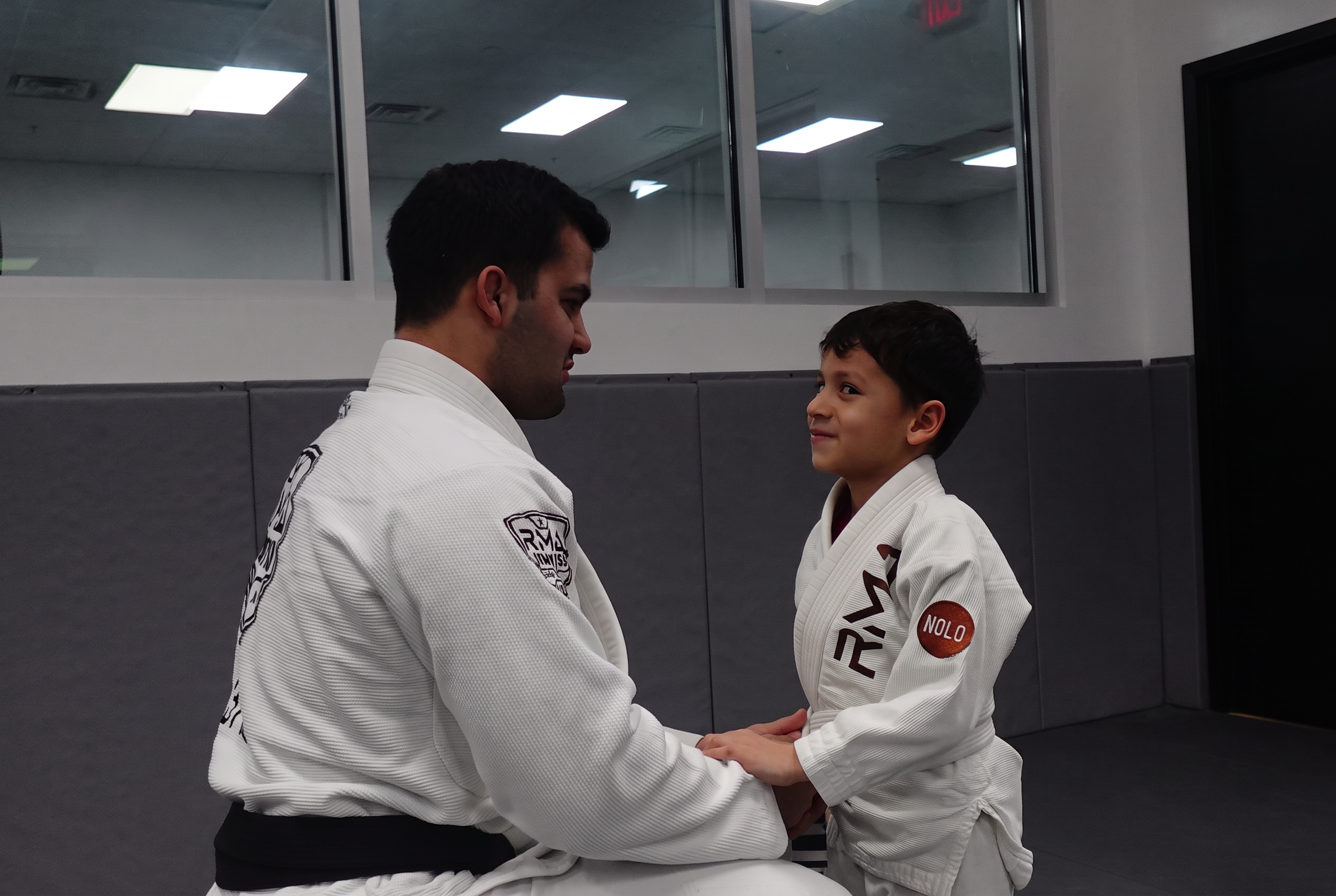 Young children in a Mighty Mites kids Brazilian Jiu-Jitsu class at RMA in Nolensville, TN